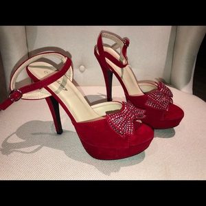 Embellished bow platform heels